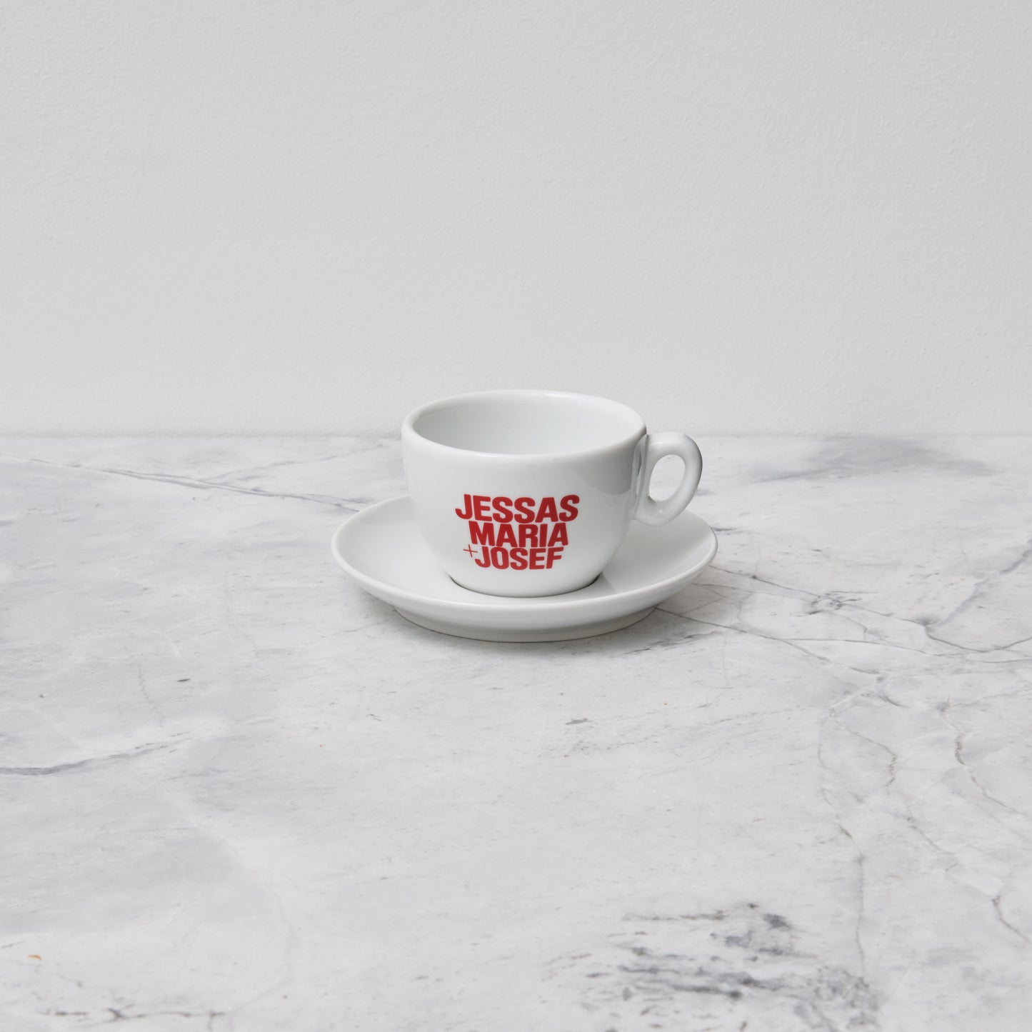 Tasse mit Untertasse JM+J