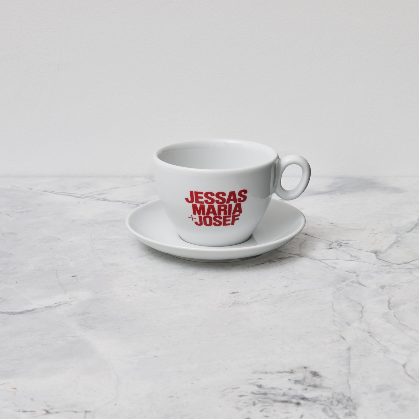 Tasse mit Untertasse JM+J